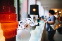 Kaboompics - White Abstract Glass Sculpture Beside an Orange Murano Vessel