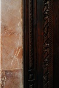 Kaboompics - Historic Wooden Door and Marble Wall Detail