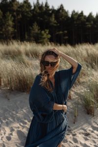 Kaboompics - Blonde Woman in Blue Kaftan Dress Beach Portrait