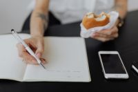 Kaboompics - Handwriting Notes With Sandwich and Smartphone