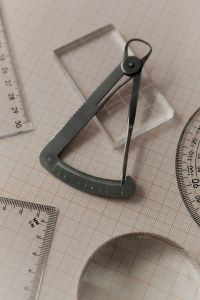 Kaboompics - Precision Stainless Steel Caliper on Graph Paper