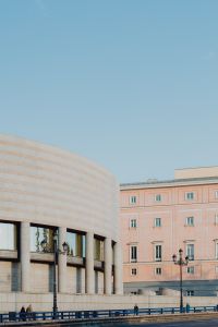 Kaboompics - Vertical Madrid Cityscape with Curved Stone Building and Pink Historic Facade
