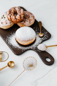 Kaboompics - Homemade Raspberry Polish Paczki Donut with Powdered Sugar