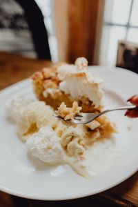 Kaboompics - Apple pie with whipped cream and ice cream in Cafe Verte