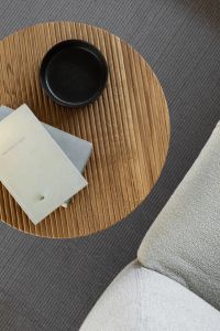 Kaboompics - Vertical Overhead Coffee Table Styling with Black Cup and Books