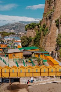 Kaboompics - Marina Grande Beach Cabins Beneath Sorrento Cliffside