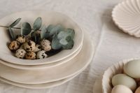 Kaboompics - Quail Eggs And Eucalyptus In Layered Ceramic Bowls