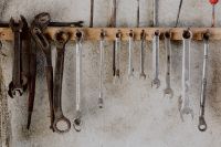 Kaboompics - Assorted Wrench Sizes Organized on a Weathered Workshop Wall