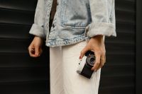 Kaboompics - Woman Holding A Vintage Film Camera