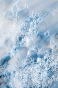 Kaboompics - Glossy Clear Gel Bubbles in Blue and White Skincare Texture, Macro Beauty Background