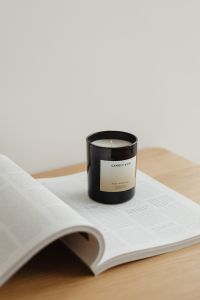 Kaboompics - Scented Candle in a Minimal Beige Interior with Copy Space