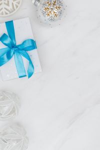 Christmas Gift Flat Lays with Blue Ribbons, Blank Cards and Holiday Ornaments