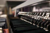 Kaboompics - Collection of design fabrics on hangers