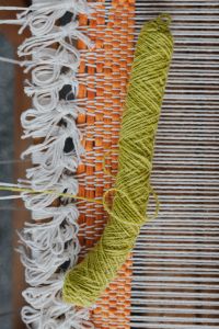 Kaboompics - Colorful Yarn on a Wooden Weaving Shuttle