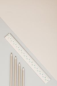 Kaboompics - Wooden Ruler and Pencils on Diagonal Neutral Background