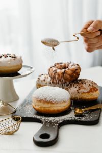 Kaboompics - Homemade Raspberry Polish Paczki Donut with Powdered Sugar