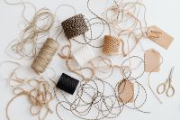 Kaboompics - Assorted Jute String, Kraft Tags And Scissors Flat Lay