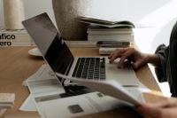 Kaboompics - Close-Up of Laptop and Architectural Documents with Material Samples