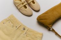 Kaboompics - Yellow Shorts, Beige Flats and Mustard Handbag Flat Lay