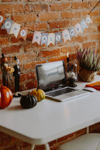 Kaboompics - Halloween Desk Decor Against Brick Wall