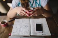 Kaboompics - Woman holding cup of coffee