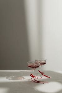 Kaboompics - Close-Up of Red Cocktails Beside a Heart-Shaped Cake