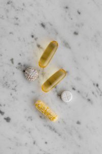 Kaboompics - Mixed Vitamins and Tablets on White Marble