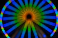 Kaboompics - Blue Ferris Wheel Spokes with a Golden Center Glow