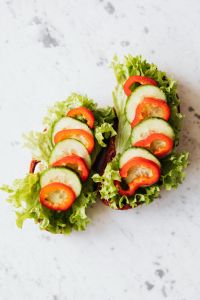 Kaboompics - Vegetable Sandwich Pair with Cucumber and Tomato on Marble