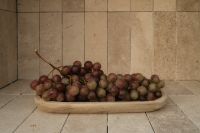 Kaboompics - Red Grapes on Ceramic Platter in Stone Niche