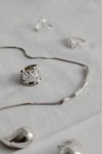 Kaboompics - Silver Jewelry Still Life with Rings and Earrings