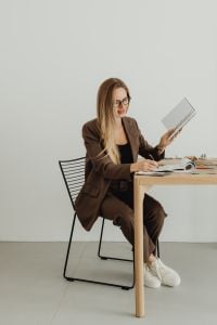 Kaboompics - Architect Reviewing Project Drawings at Studio Desk