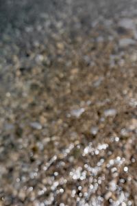 Kaboompics - Abstract Blurred Pebble Beach Texture with Soft Coastal Bokeh