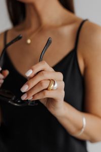 Kaboompics - Black Camisole with Sunglasses, Rings and Bracelet