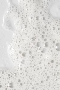 Kaboompics - White Facial Foam with Large Translucent Bubbles, Skincare Macro Background