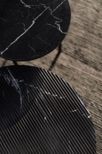 Kaboompics - Two Black Marble Side Tables with White Veining and Ribbed Bases, Modern Living Room Furniture
