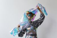 Kaboompics - Asian Model Portrait in Cool Silver and Purple Neon Light
