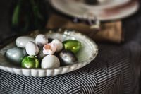 Kaboompics - Round dinner table decorated with easter motifs
