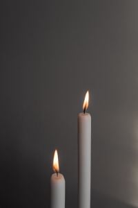 Kaboompics - Two Lit White Candles Close-Up