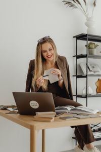Kaboompics - Interior Designer Discussing Furniture Finishes in Online Meeting