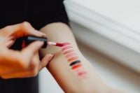 Kaboompics - Lipstick swatches on woman hand