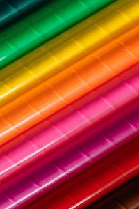Kaboompics - Diagonal Rainbow Crayon Strokes in Green, Yellow and Pink for Kids’ Art Backgrounds