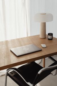 Kaboompics - Neutral Desk Decor with Travertine Lamp and Black Candle