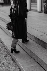 Kaboompics - Black and White Detail of Woman Climbing City Steps