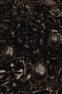 Kaboompics - Black Faceted Beads and Pearls in a Dark Jewelry Flat Lay