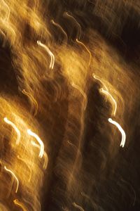 Kaboompics - Vertical Warm Gold Light Trails on Brown, Abstract Motion Blur Wallpaper for Design