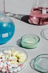 Kaboompics - Pharmaceutical Pills and Colorful Glass Flasks