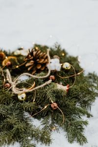 Kaboompics - Snowy Evergreen Wreath With Dried Fruit and Natural Ornaments