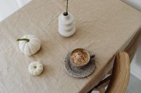 Kaboompics - Overhead Autumn Coffee Still Life with Two White Pumpkins and Goldenrod in a Sculptural Vase