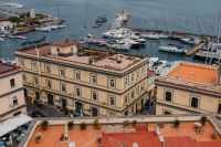Kaboompics - Naples Harbor Yachts Framed by Historic Rooftops